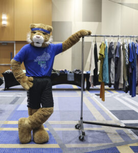 Students peruse free clothes at the Recycling Thrift Shop on April 4, 2025, in Lexington, Ky. Photo by Carter Skaggs