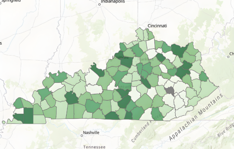 Map of Kentucky counties shaded in varying shades of green, with several counties shown in gray or white.
